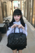 Treat Ürself original quilting boston bag